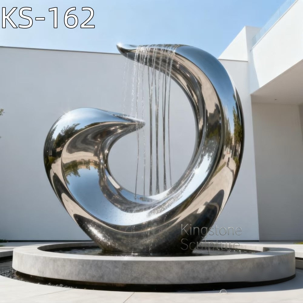A monumental Kingstone KS-162 mirror polished stainless steel twist sculpture installed in a luxury estate garden, reflecting the sky and greenery.
