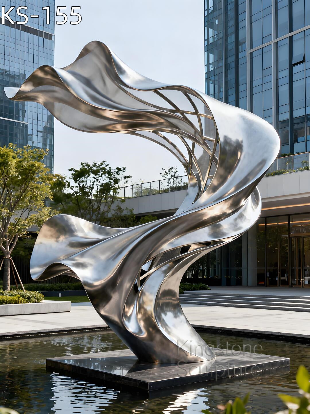 Monumental Kingstone KS-155 mirror polished stainless steel fluid twist sculpture installed in a contemporary outdoor garden near water, reflecting the environment.